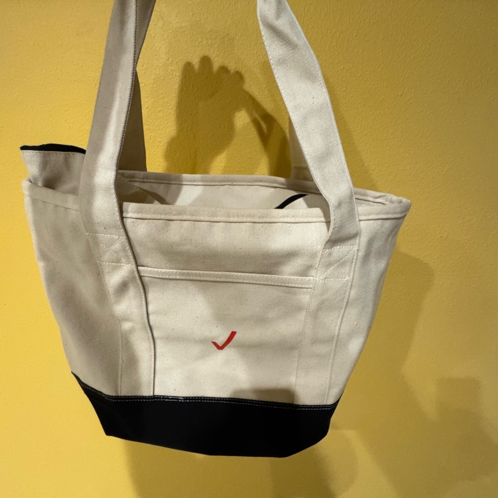 Verizon beige tote bag